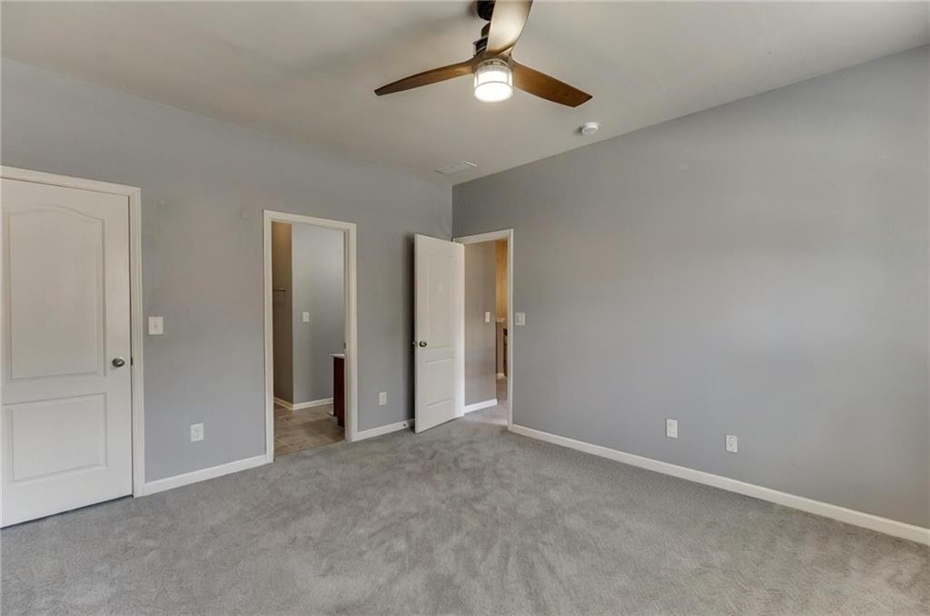 2201 Spring Sound Lane Buford, GA 30519 - Photo 30 of 66 a view of an empty room and chandelier fan