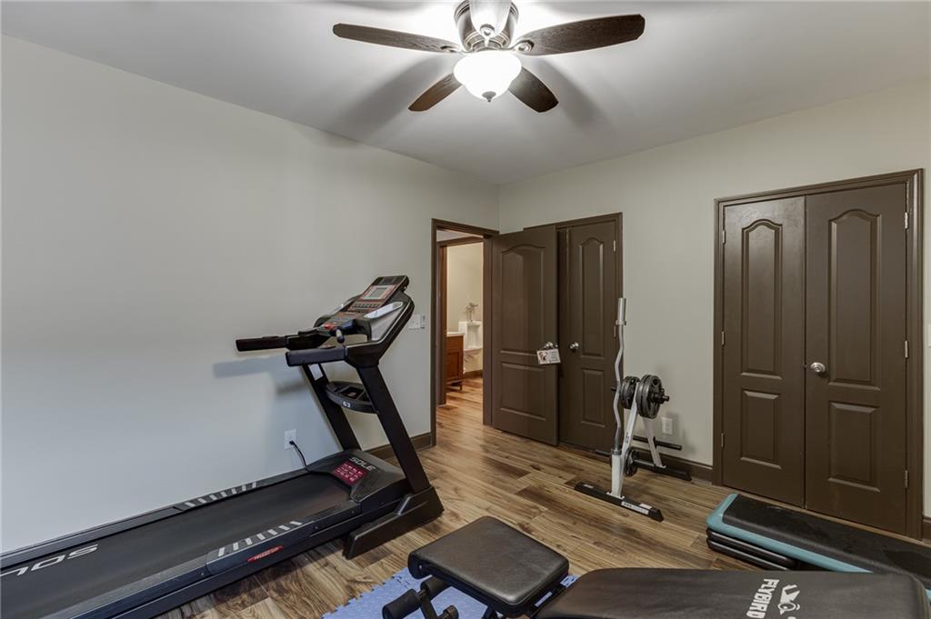 2201 Spring Sound Lane Buford, GA 30519 - Photo 44 of 66 a room with gym equipment