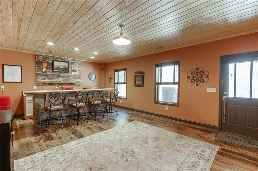 2201 Spring Sound Lane Buford, GA 30519 - Photo 46 of 66 a view of a livingroom with furniture and a rug