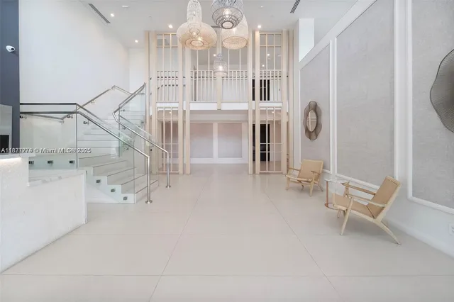 a view of a hallway with washer and dryer