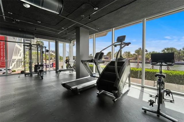 a view of a building with a yard