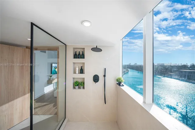 a view of a living room and bathroom