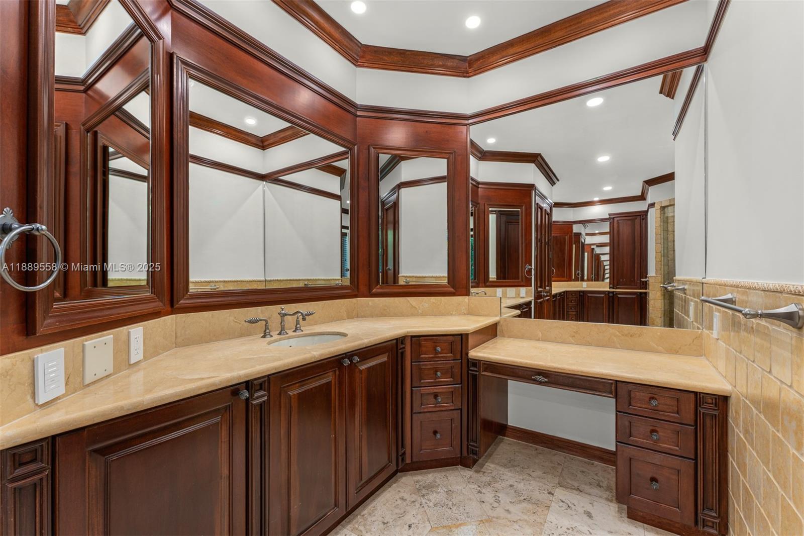 6350 Southwest 92nd Street Pinecrest, FL 33156 - Photo 17 of 41 a bathroom with a double vanity sink and a large mirror