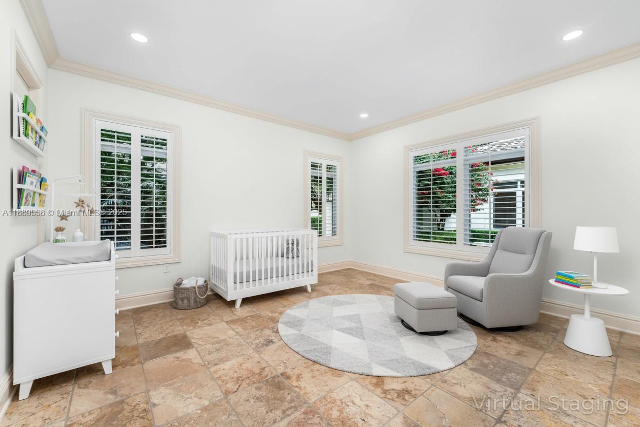 6350 Southwest 92nd Street Pinecrest, FL 33156 - Photo 22 of 41 a living room with furniture and a large window