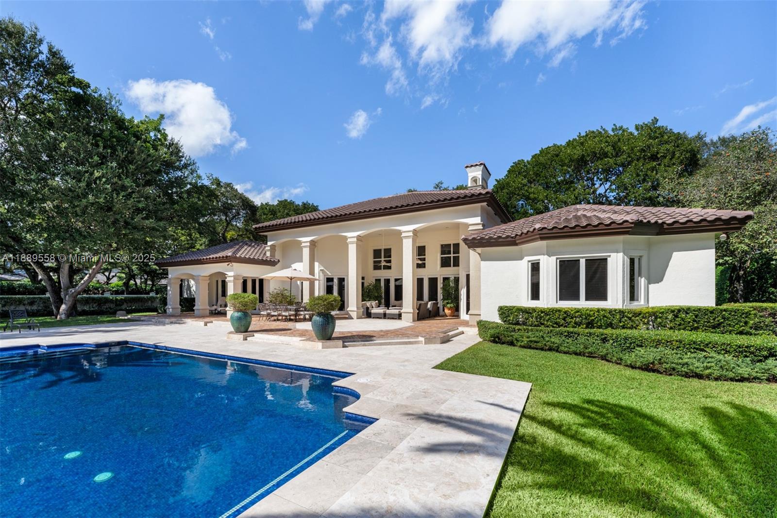 6350 Southwest 92nd Street Pinecrest, FL 33156 - Photo 29 of 41 a front view of house with yard and green space