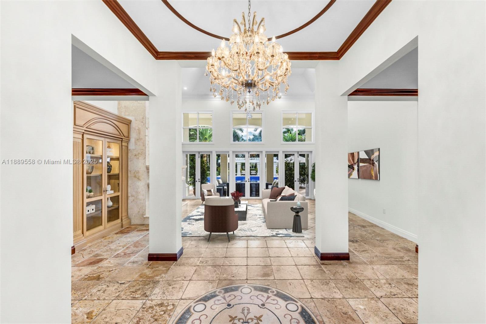 6350 Southwest 92nd Street Pinecrest, FL 33156 - Photo 4 of 41 a view of living room filled with furniture and chandelier