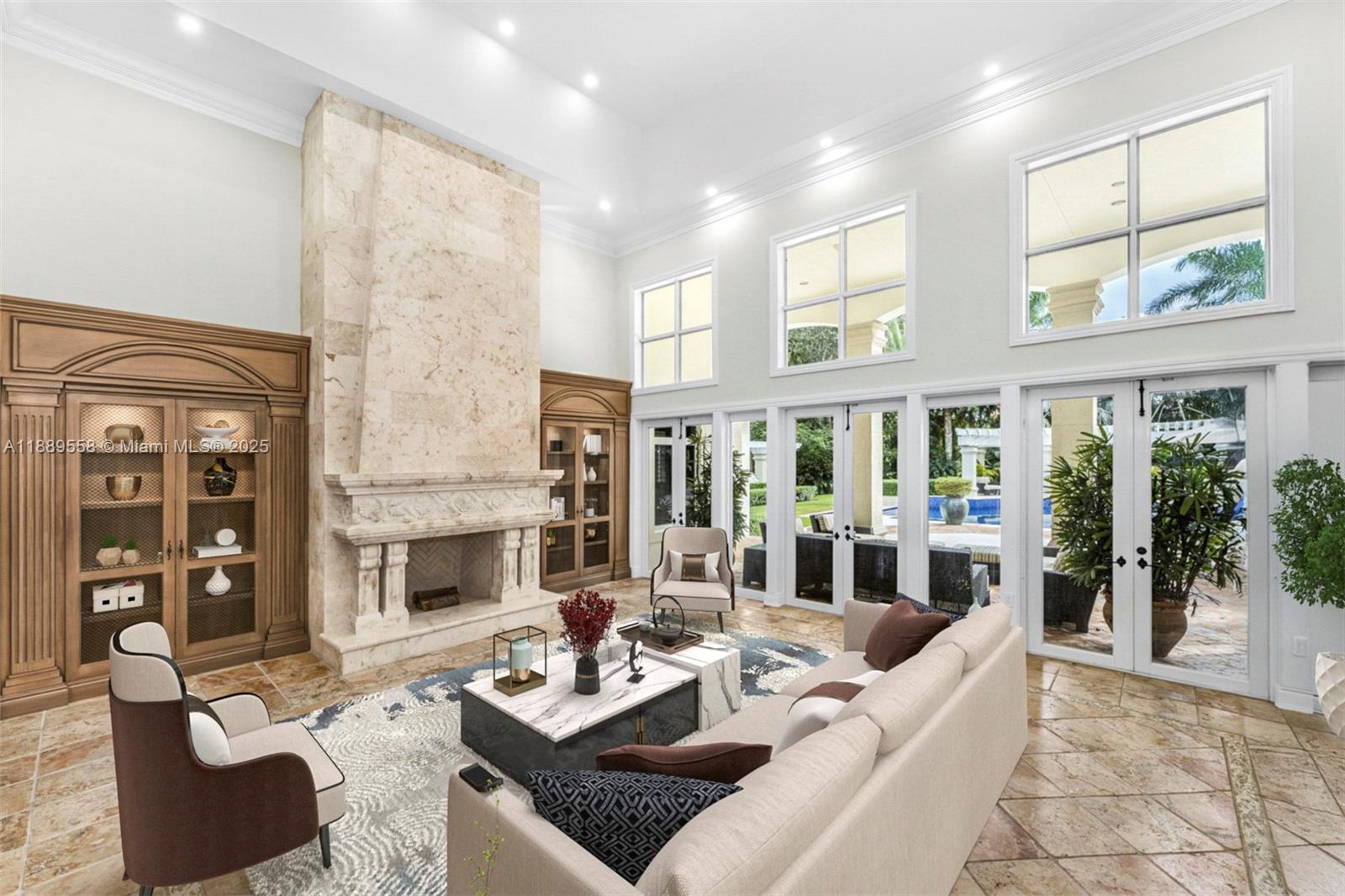 6350 Southwest 92nd Street Pinecrest, FL 33156 - Photo 5 of 41 a living room with furniture fireplace and a large window
