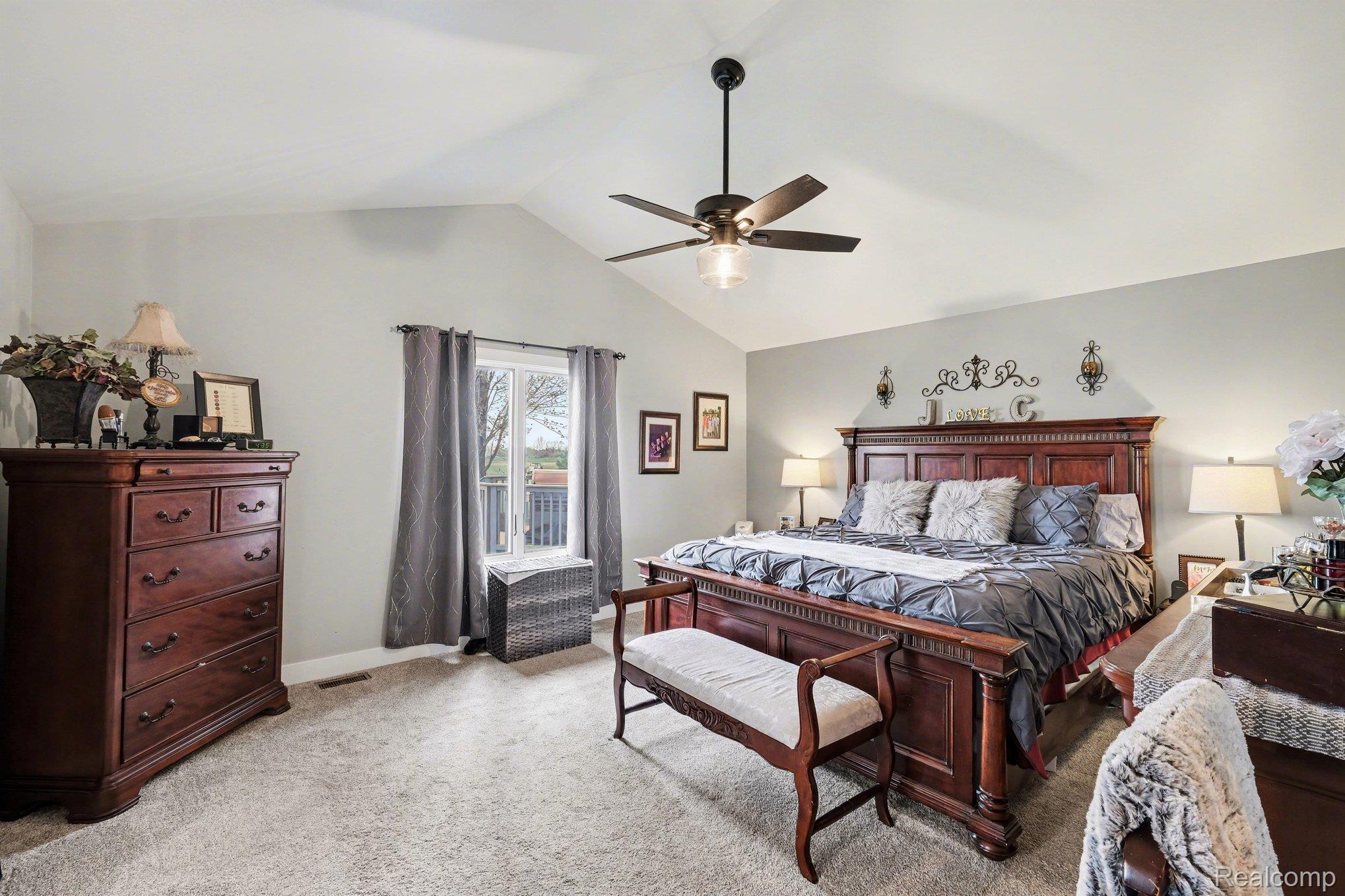 9084 Copper Ridge Drive Davison, MI 48423 - Photo 22 of 42 Bedroom with light carpet and ceiling fan