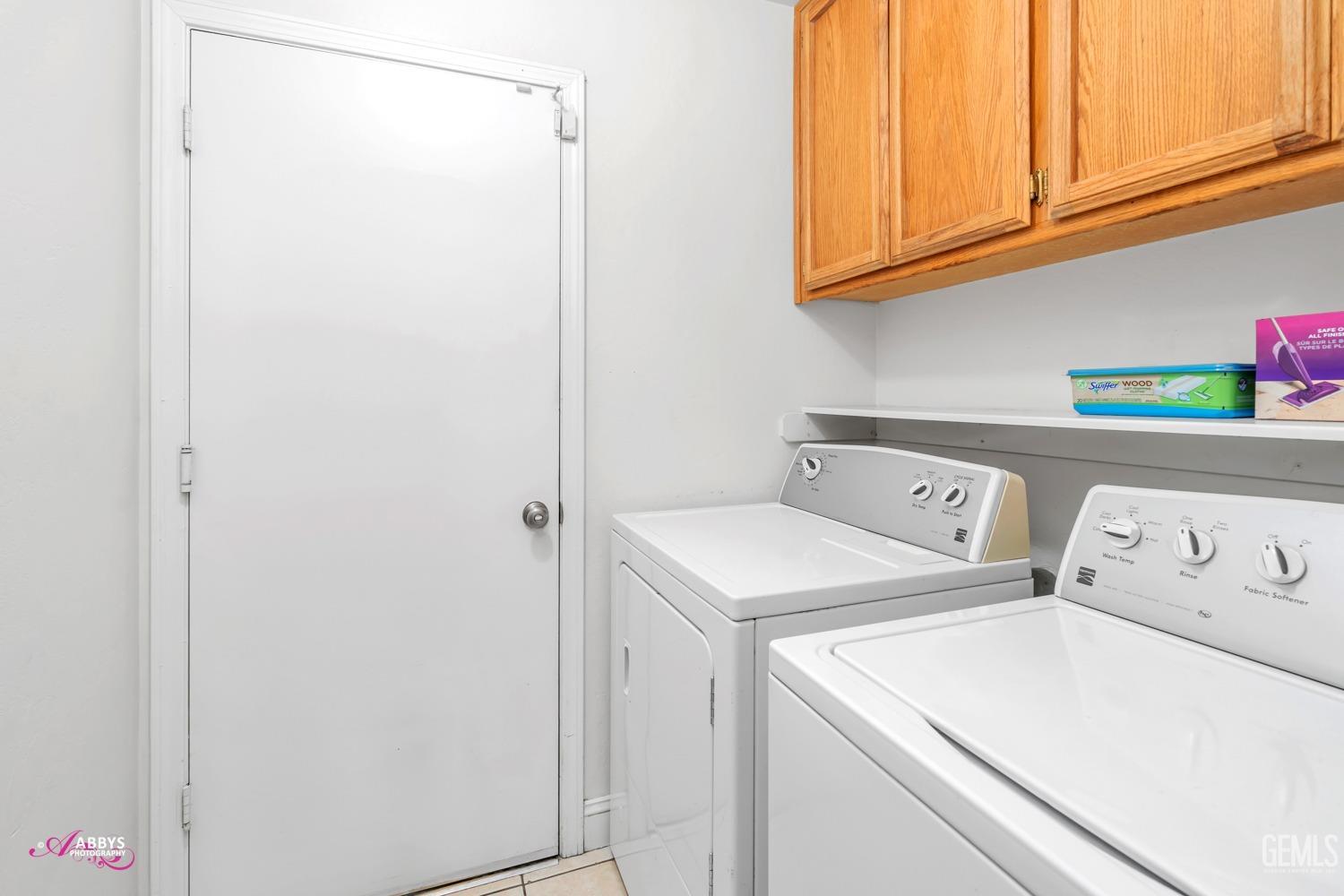 Undisclosed Address Bakersfield, CA 93312 - Photo 17 of 30 a utility room with dryer and washer