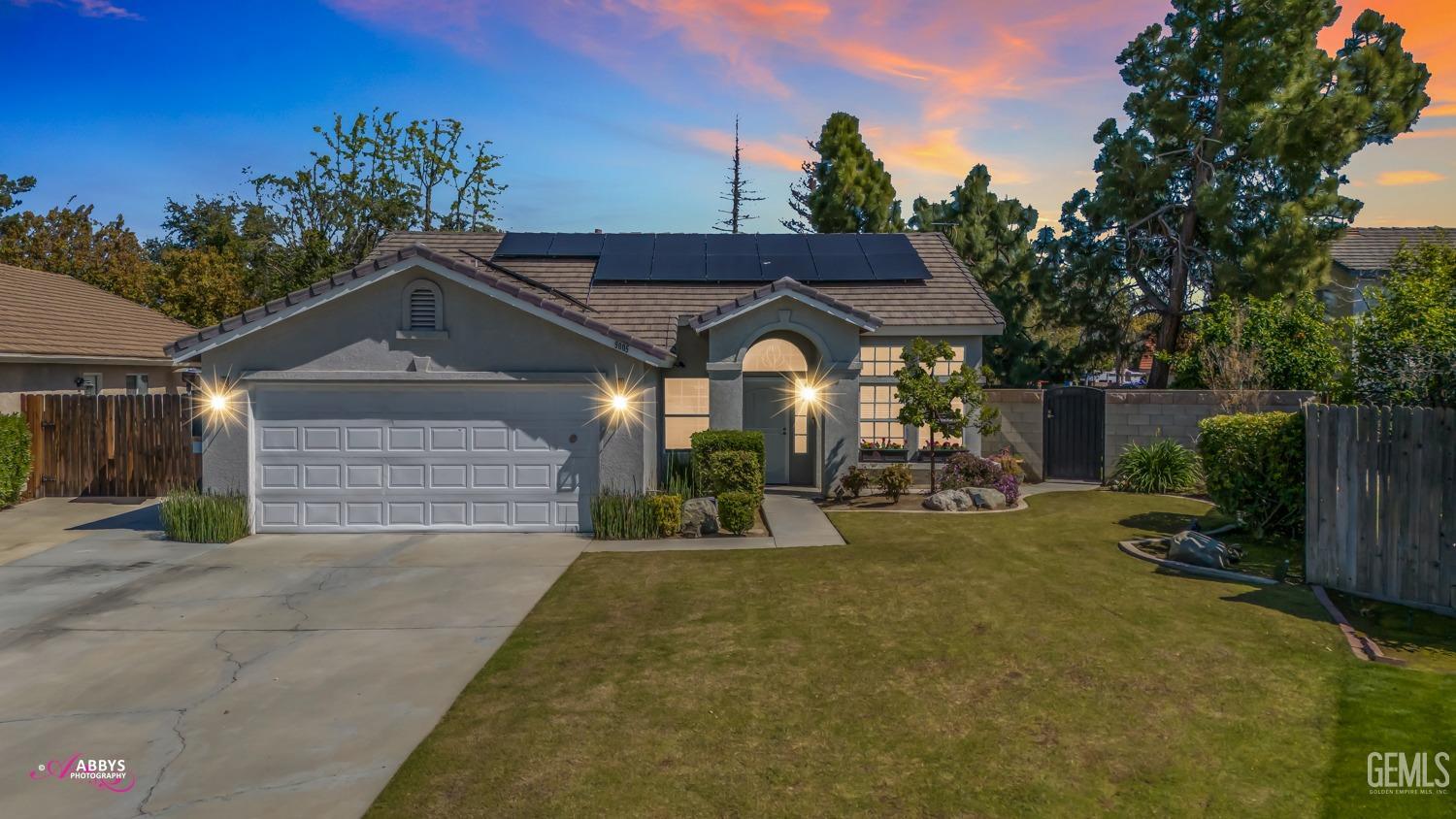 Undisclosed Address Bakersfield, CA 93312 - Photo 2 of 30 a front view of a house with garden
