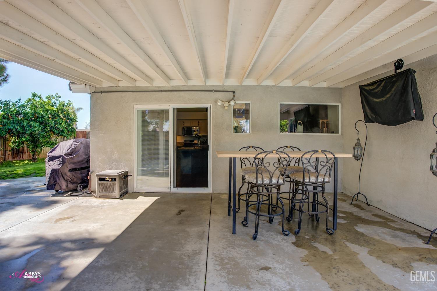 Undisclosed Address Bakersfield, CA 93312 - Photo 21 of 30 a view of a livingroom with furniture and outdoor space
