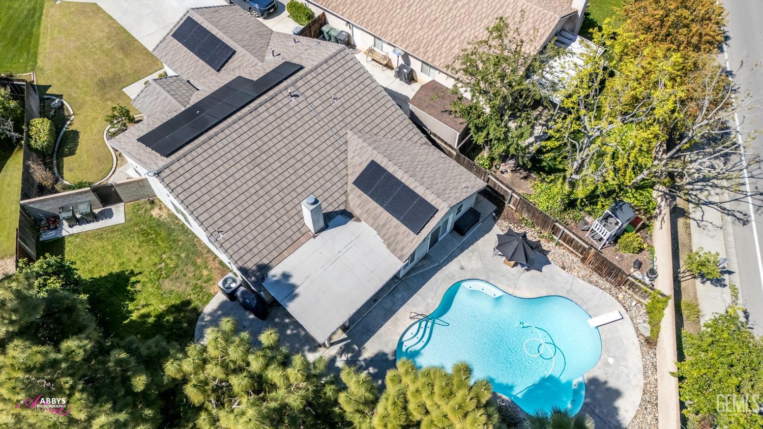 Undisclosed Address Bakersfield, CA 93312 - Photo 30 of 30 an aerial view of a house with a yard and garden