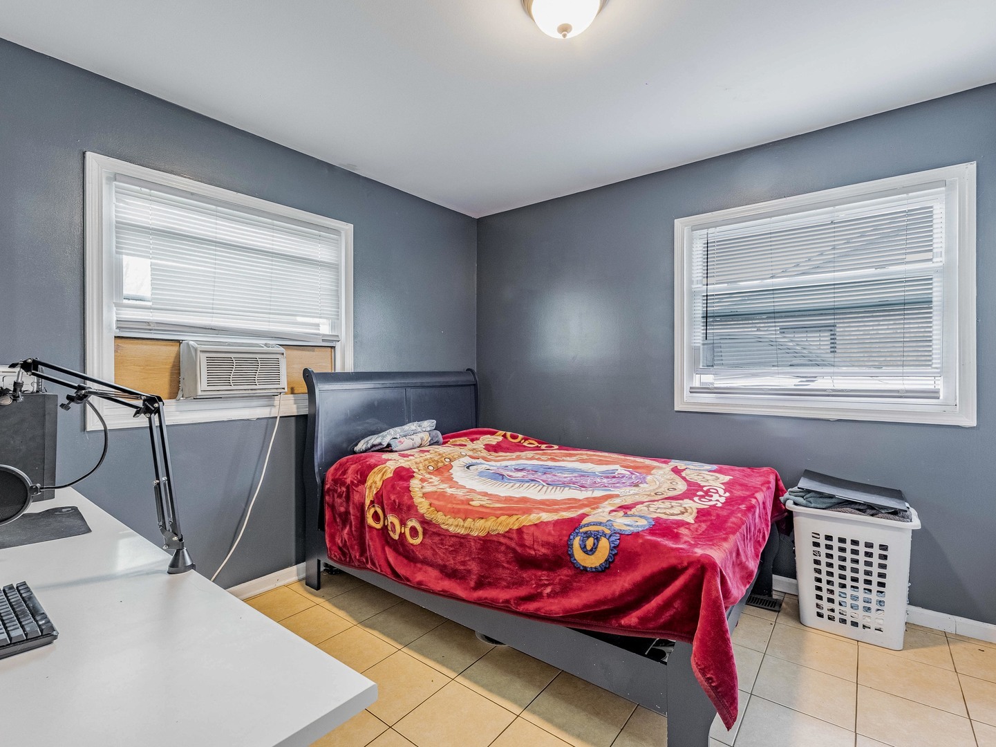 15316 Parkside Drive Markham, IL 60428 - Photo 11 of 14 a bedroom with a bed and wooden floor