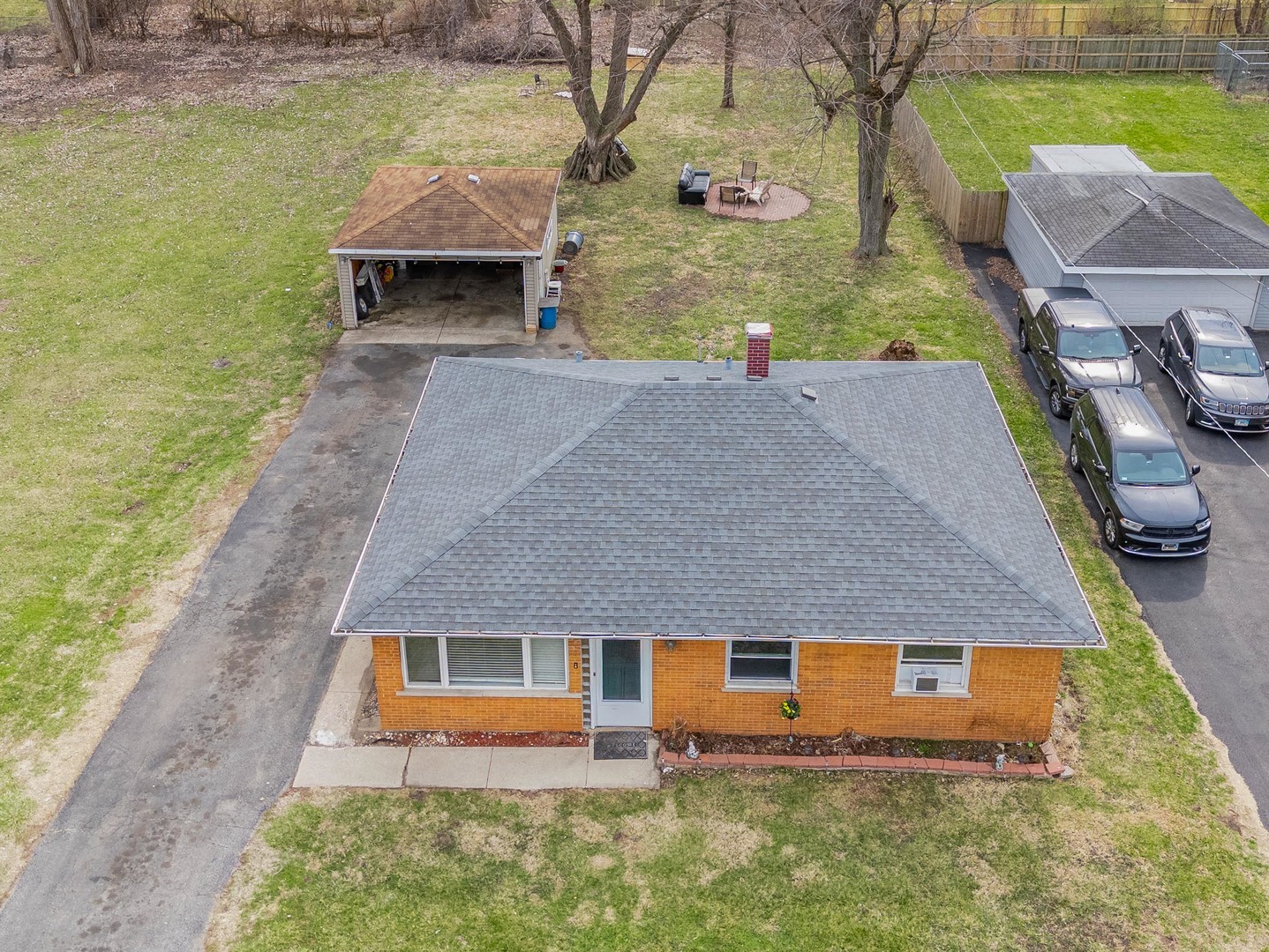 15316 Parkside Drive Markham, IL 60428 - Photo 13 of 14 an aerial view of a house with swimming pool