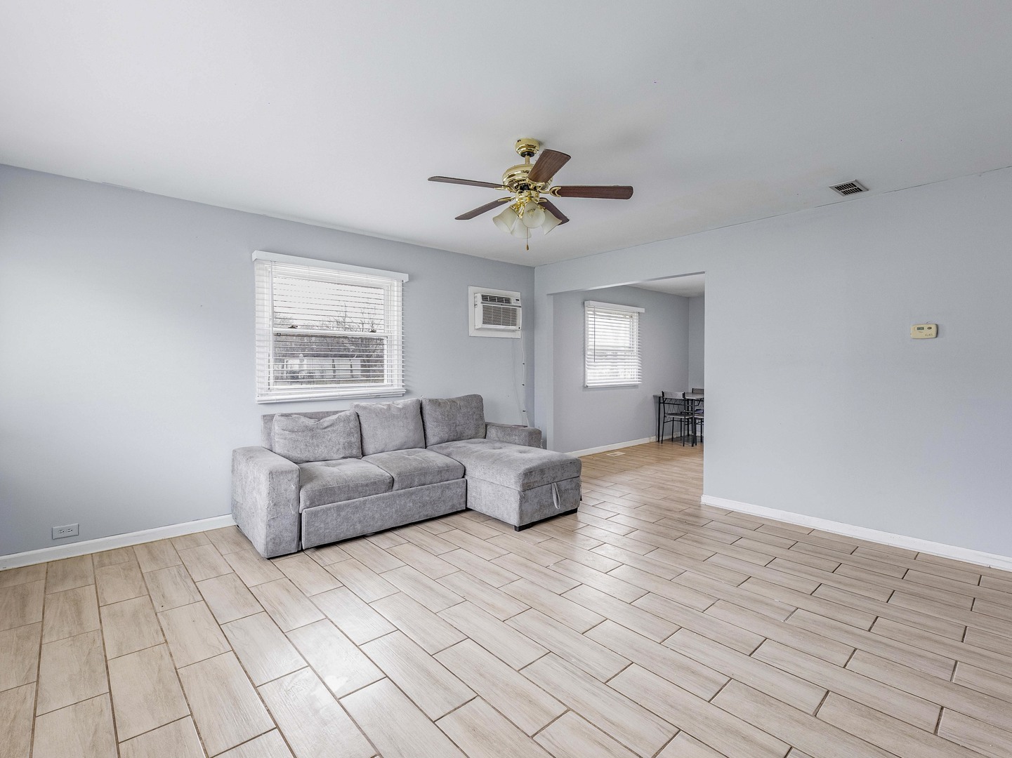 15316 Parkside Drive Markham, IL 60428 - Photo 4 of 14 a living room with furniture and a chandelier