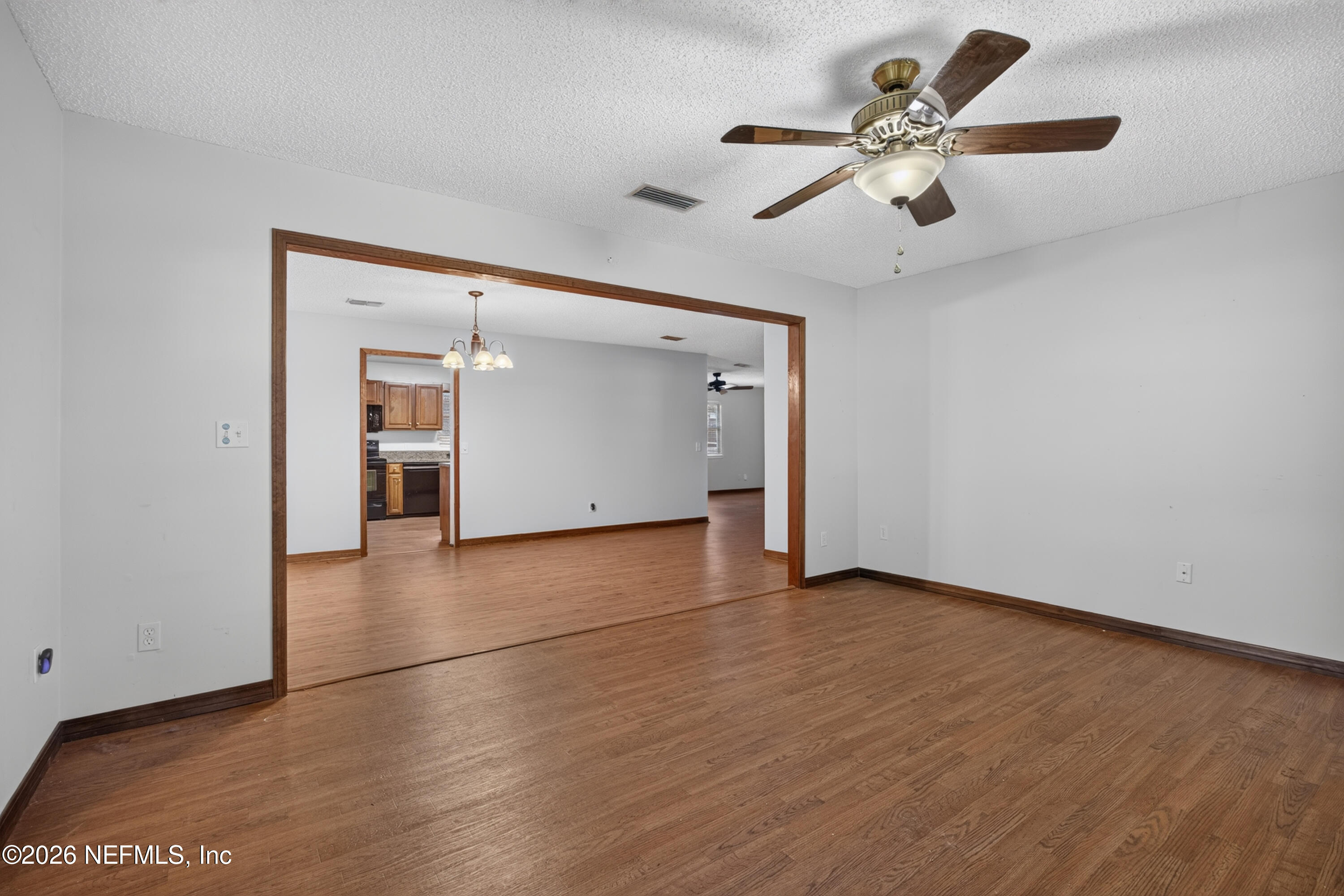 892 Branscomb Road Green Cove Springs, FL 32043 - Photo 7 of 34 07-Living Room To Dining Room