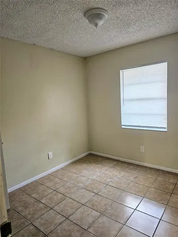 an empty room with a workbench