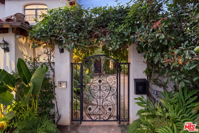 a view of a potted plant with sign board