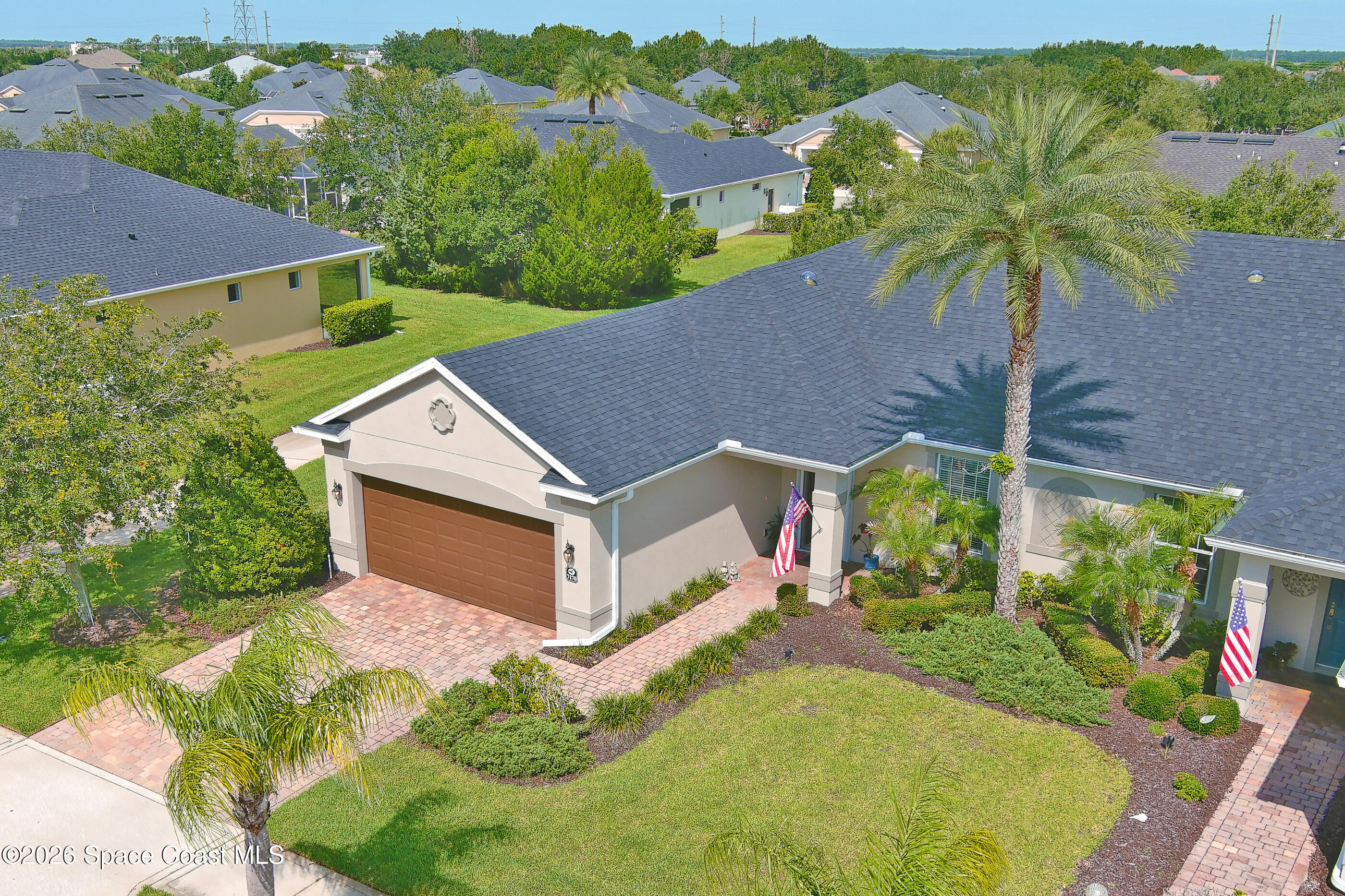 7170 Ralston Street Melbourne, FL 32940 - Photo 29 of 77 Aerial Front Yard shared with neighbor