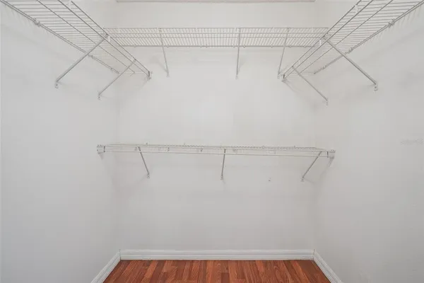 a view of a room with racks on the wall