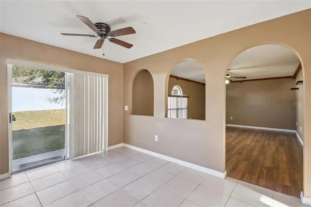 a view of livingroom with hardwood floor and a ceiling fan