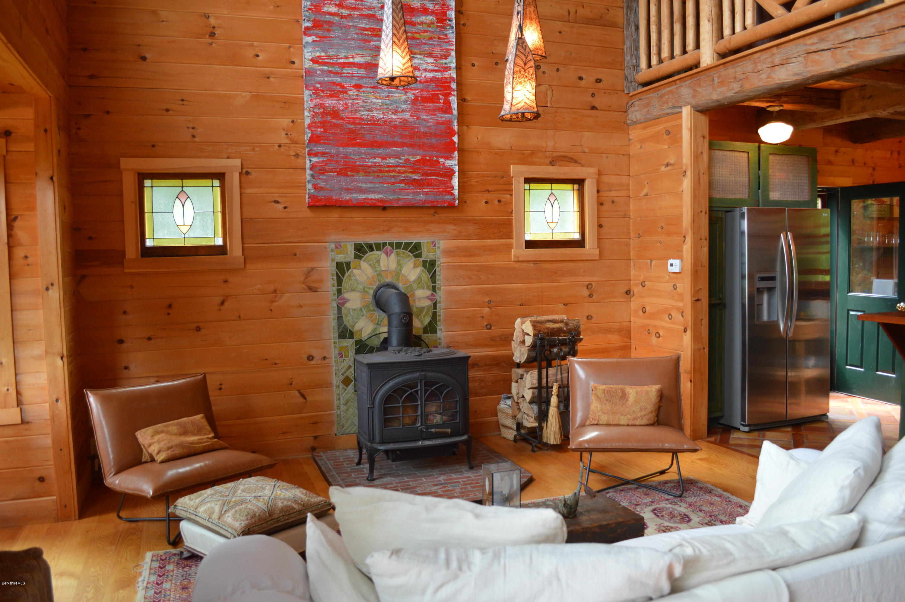 1297 Fred Snow Road Becket, MA 01223 - Photo 12 of 41 a outdoor living space with patio furniture and a fireplace