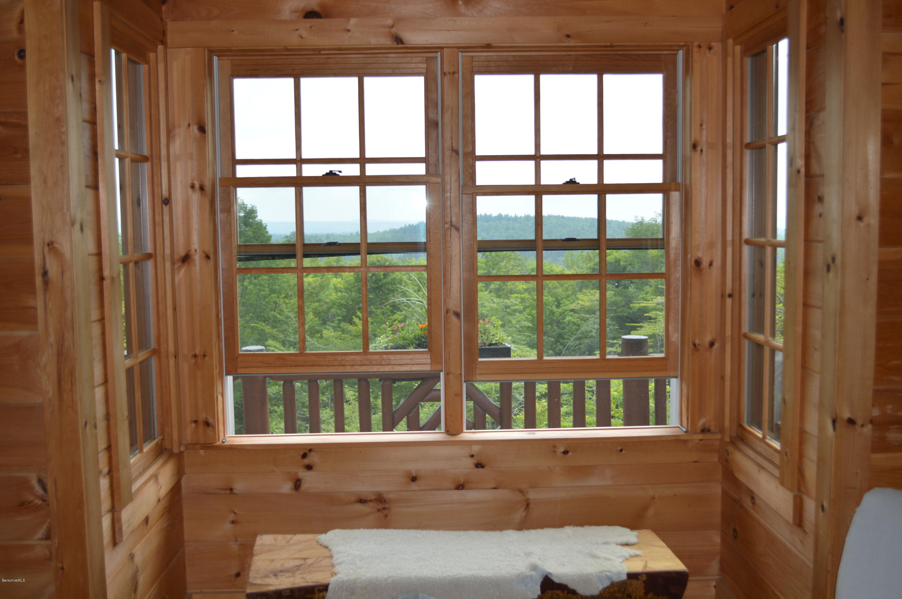 1297 Fred Snow Road Becket, MA 01223 - Photo 13 of 41 a view of a small space with a large window