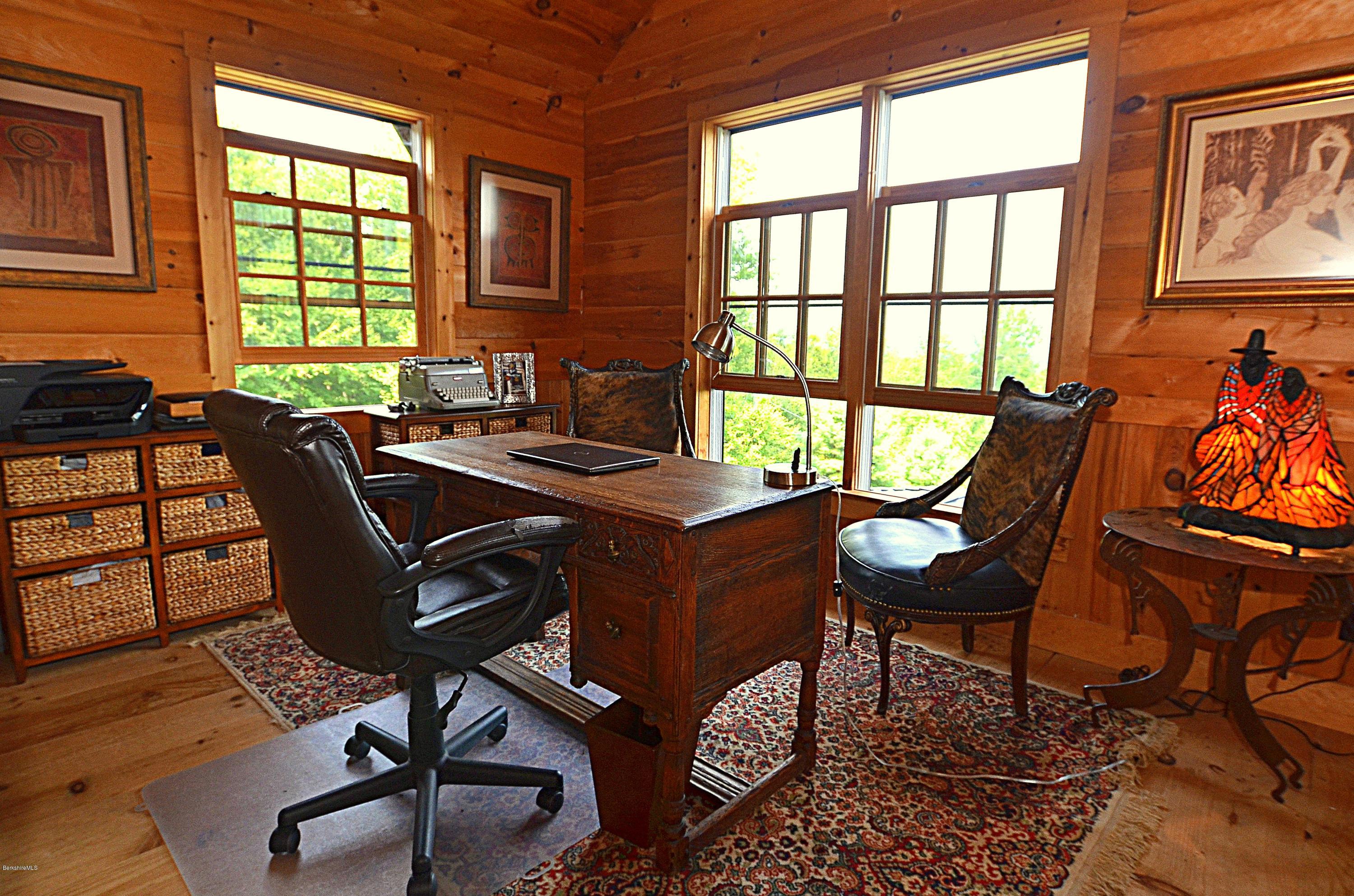 1297 Fred Snow Road Becket, MA 01223 - Photo 30 of 41 a work room with furniture and a window