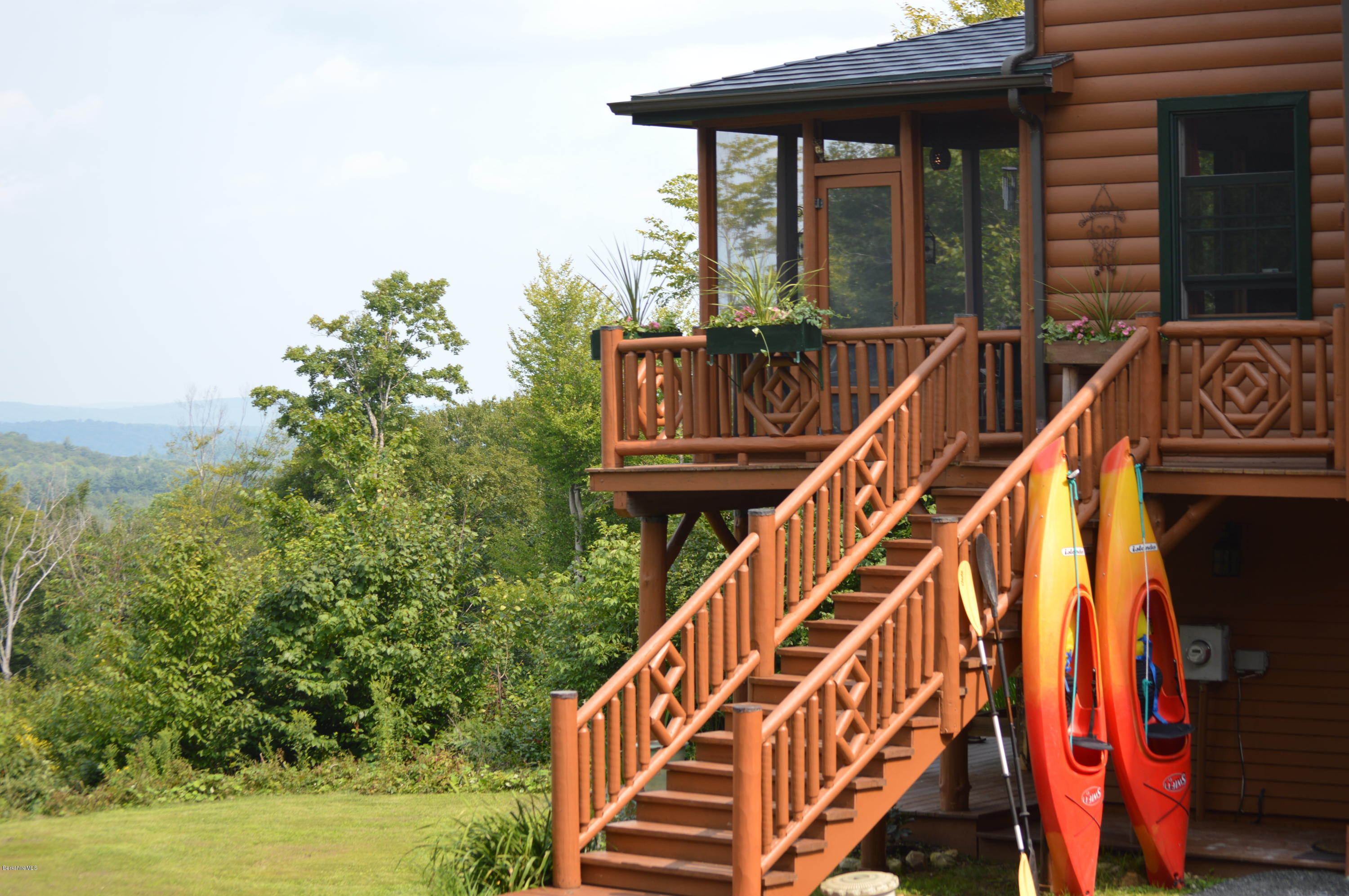1297 Fred Snow Road Becket, MA 01223 - Photo 4 of 41 a view of balcony with furniture