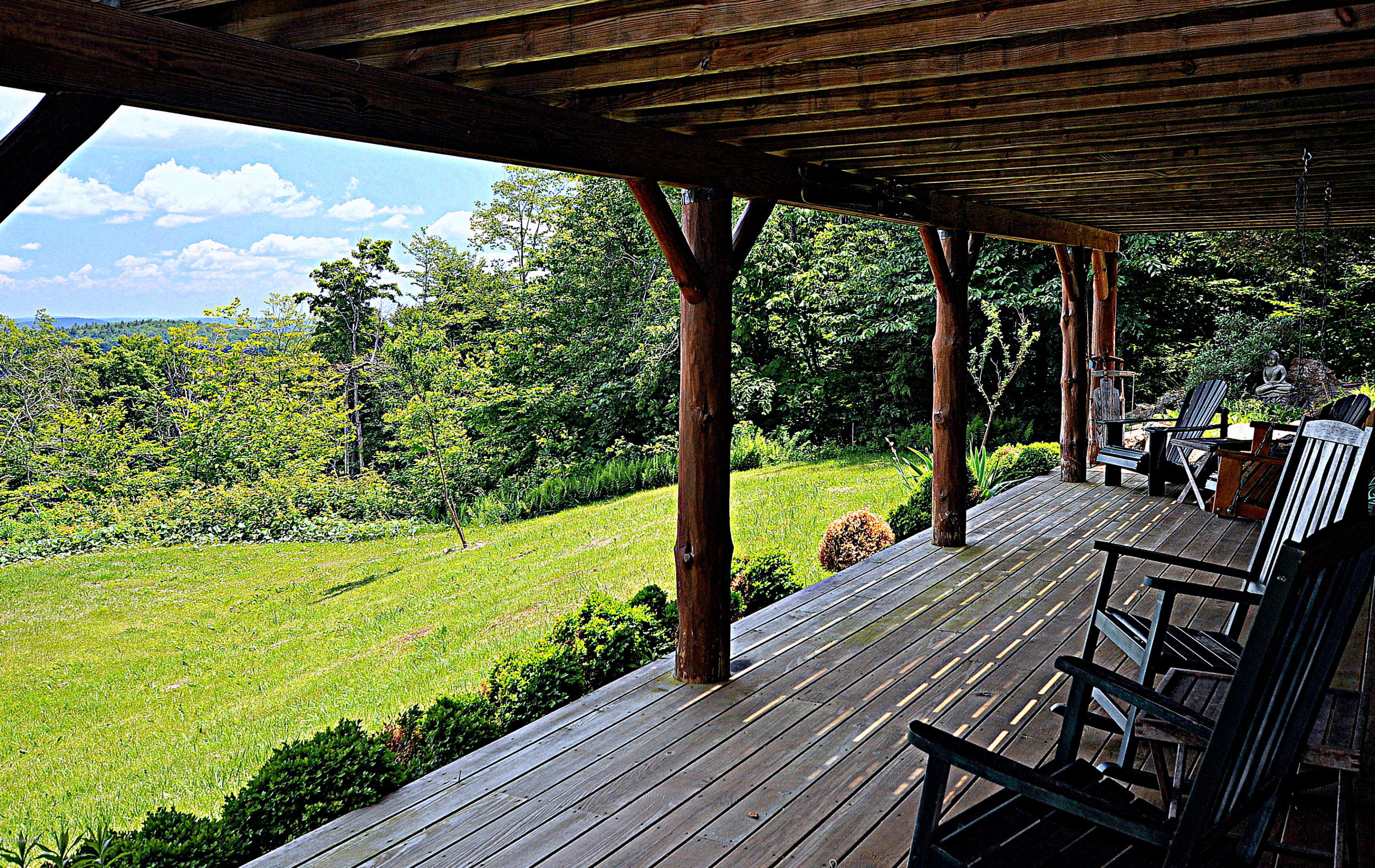 1297 Fred Snow Road Becket, MA 01223 - Photo 35 of 41 a view of a swimming pool with a patio