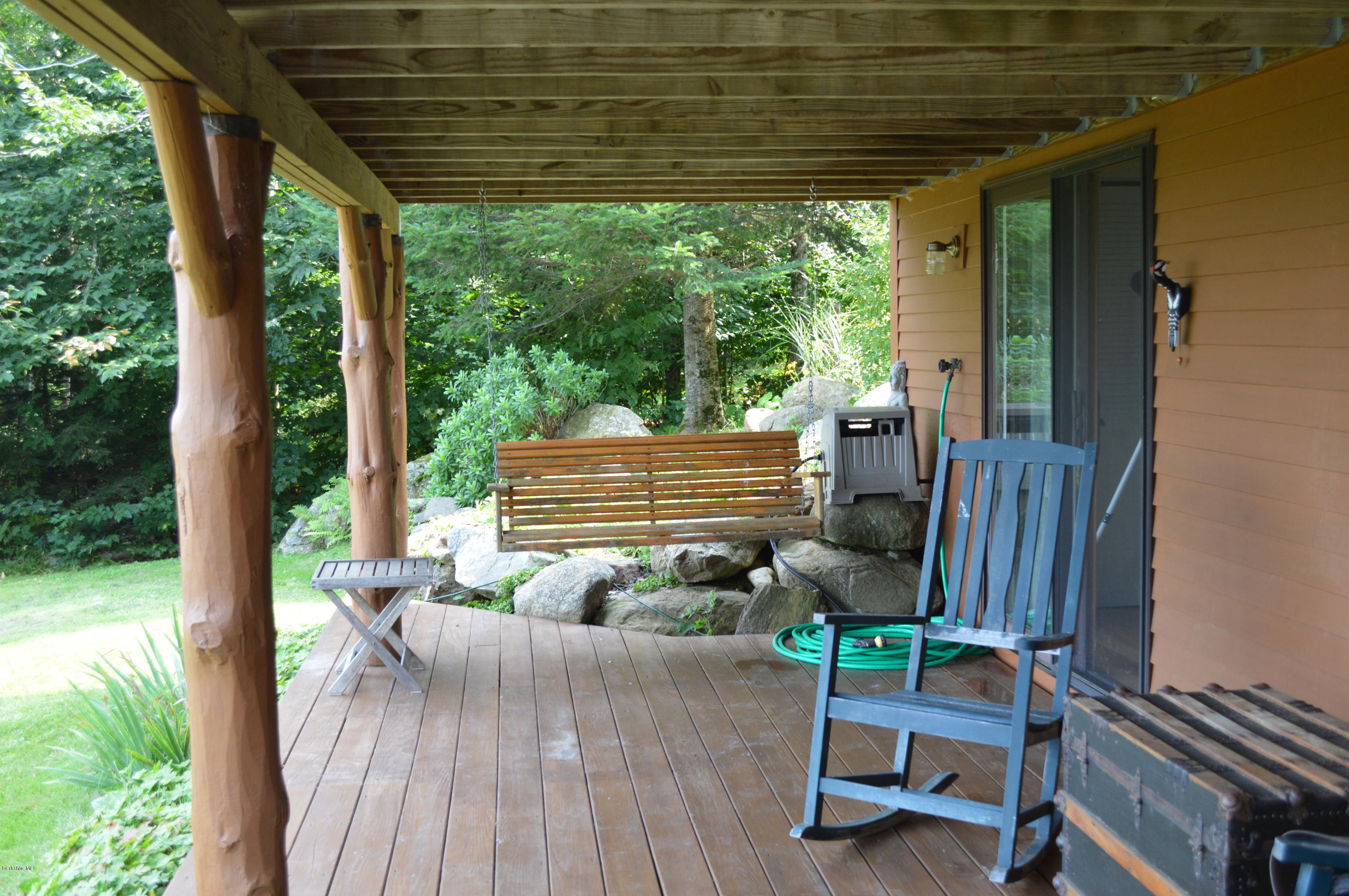 1297 Fred Snow Road Becket, MA 01223 - Photo 40 of 41 a view of two chairs in the balcony