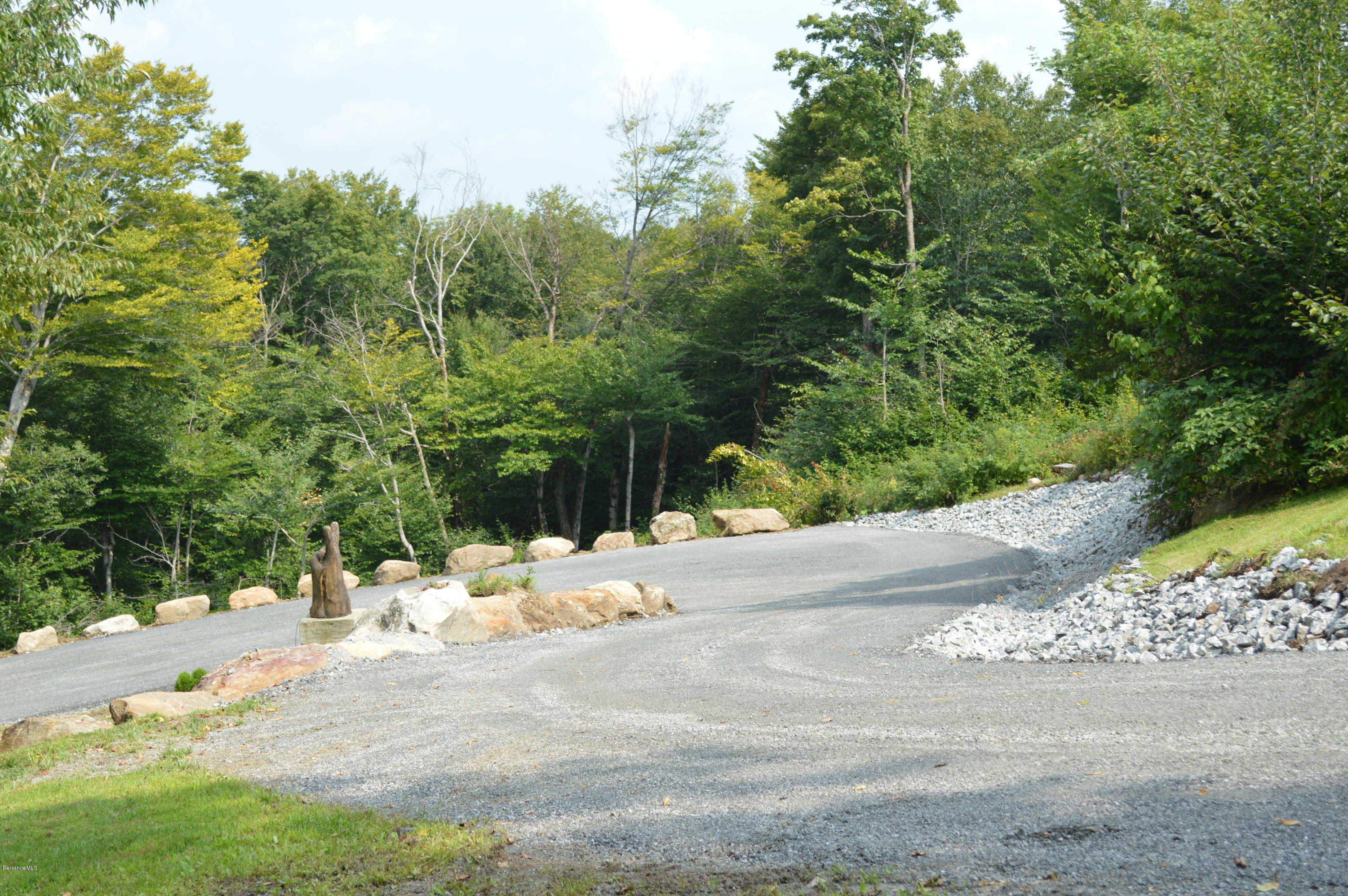 1297 Fred Snow Road Becket, MA 01223 - Photo 41 of 41 a view of a yard with plants and large trees