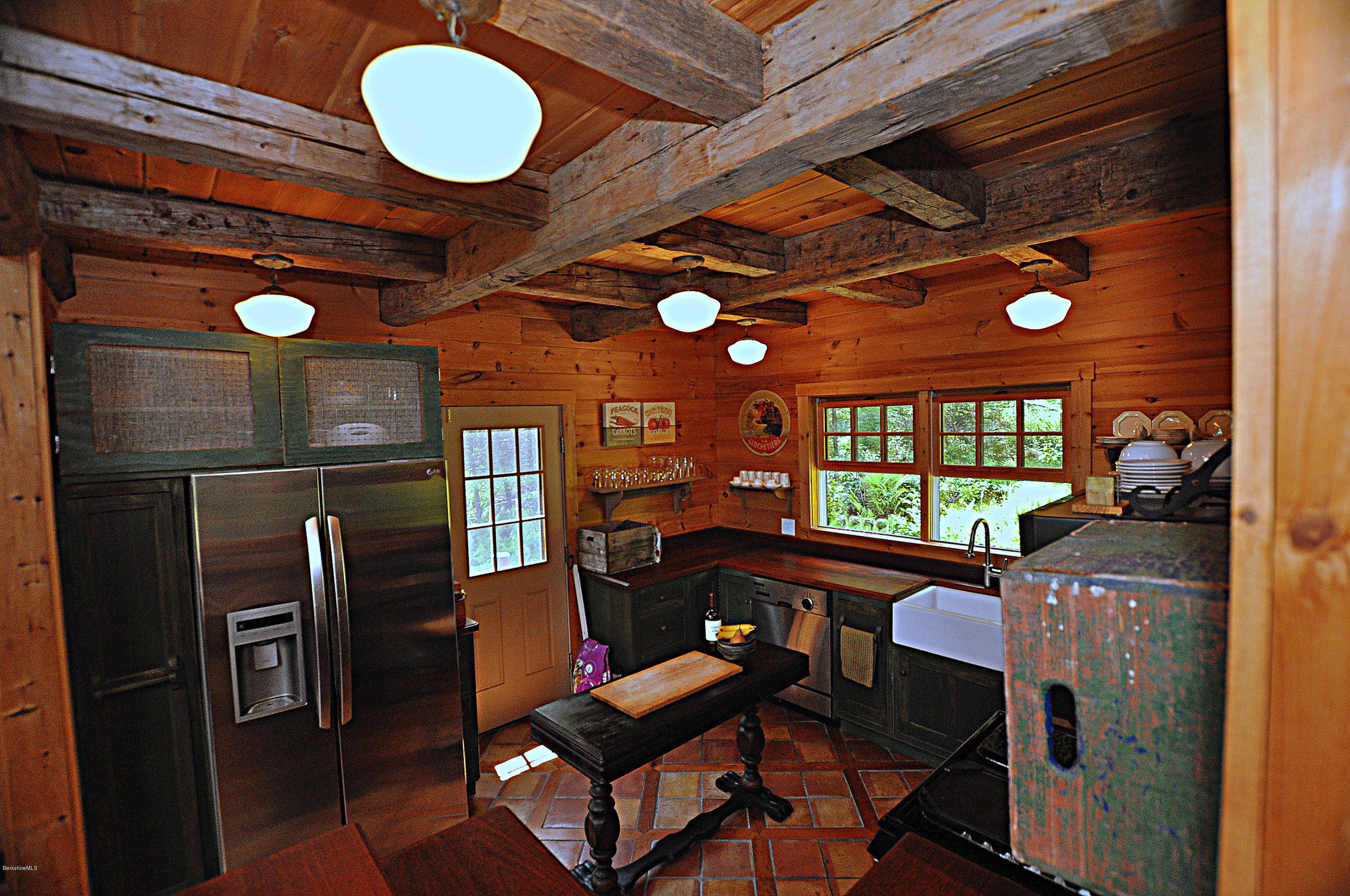 1297 Fred Snow Road Becket, MA 01223 - Photo 8 of 41 a view of a dining room with furniture and window