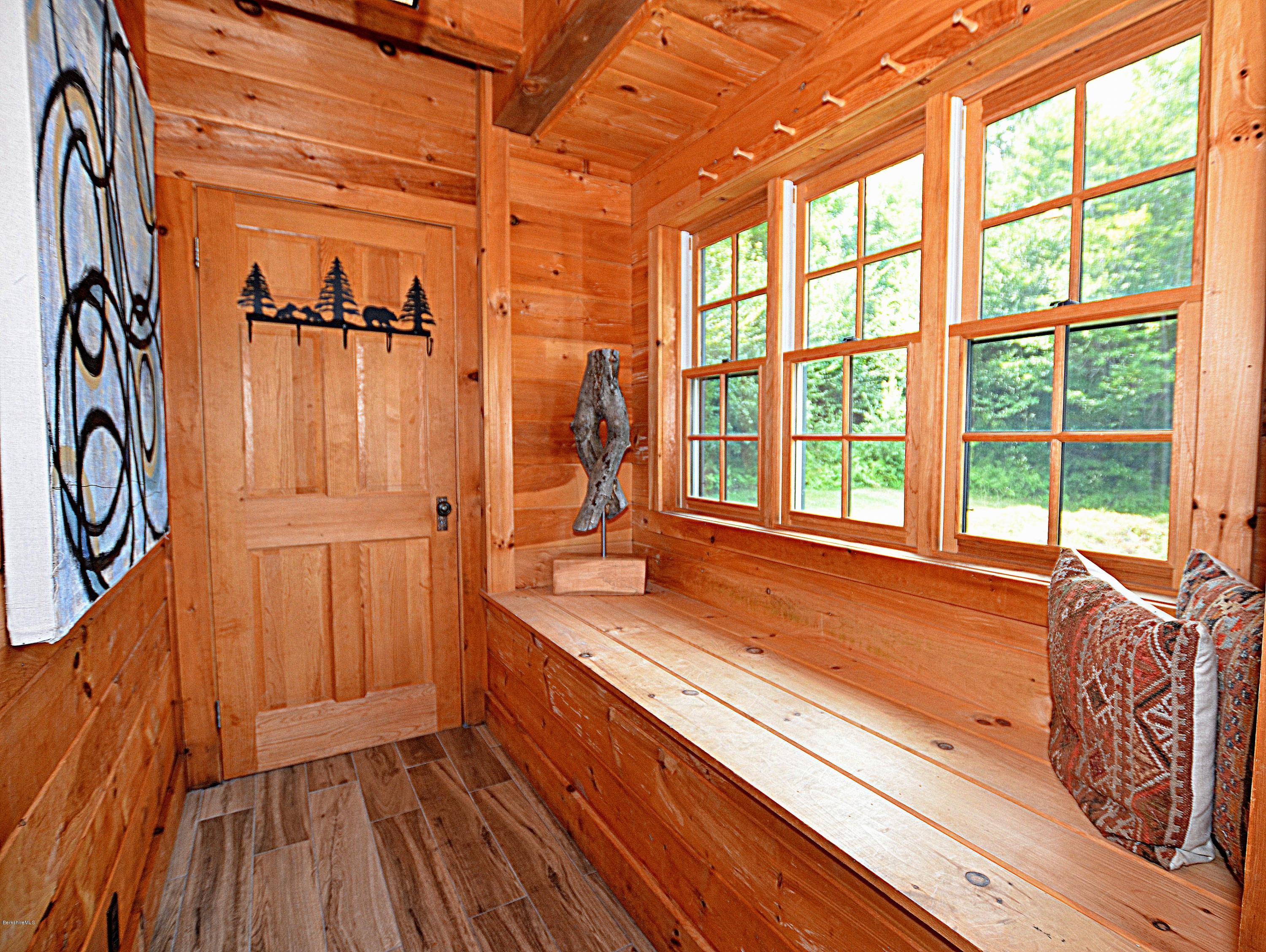 1297 Fred Snow Road Becket, MA 01223 - Photo 9 of 41 a view of a living room with a large window