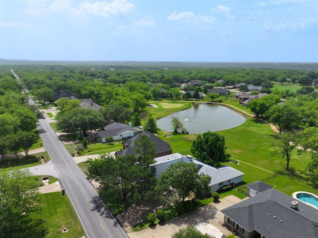 5131 Wedgefield Road nestled on the lush greenery of Pecan Plantation's Golf Course
