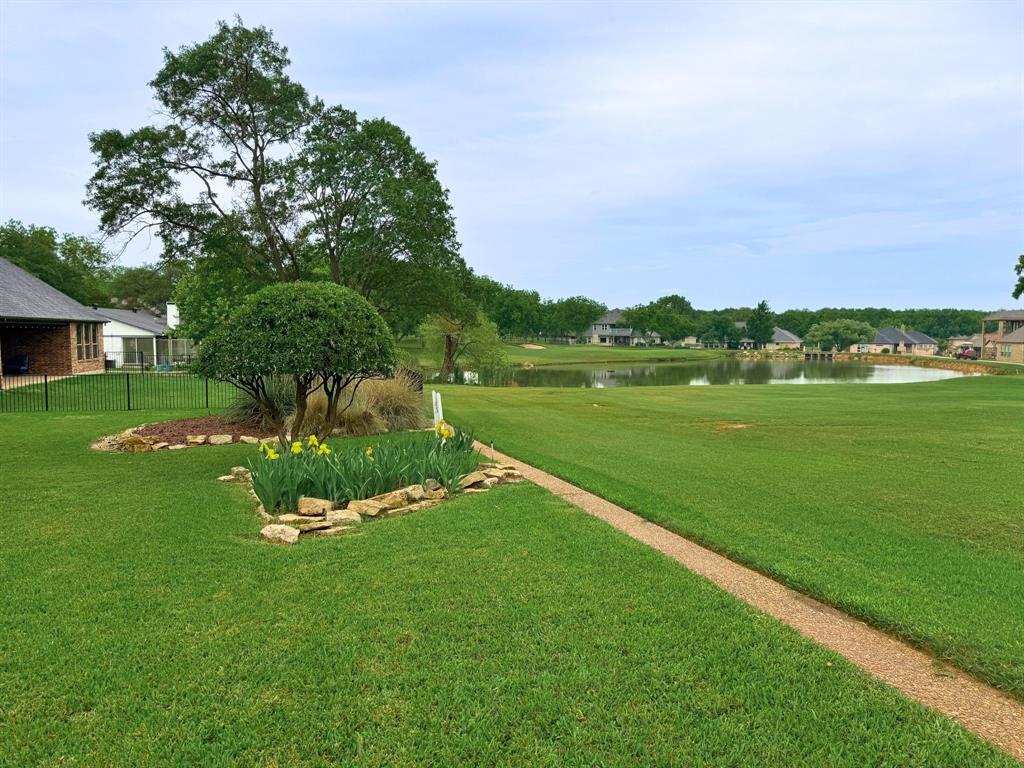 5131 Wedgefield Road Granbury, TX 76049 - Photo 5 of 33 5131 Wedgefield Road nestled on the lush greenery of Pecan Plantation's Golf Course
