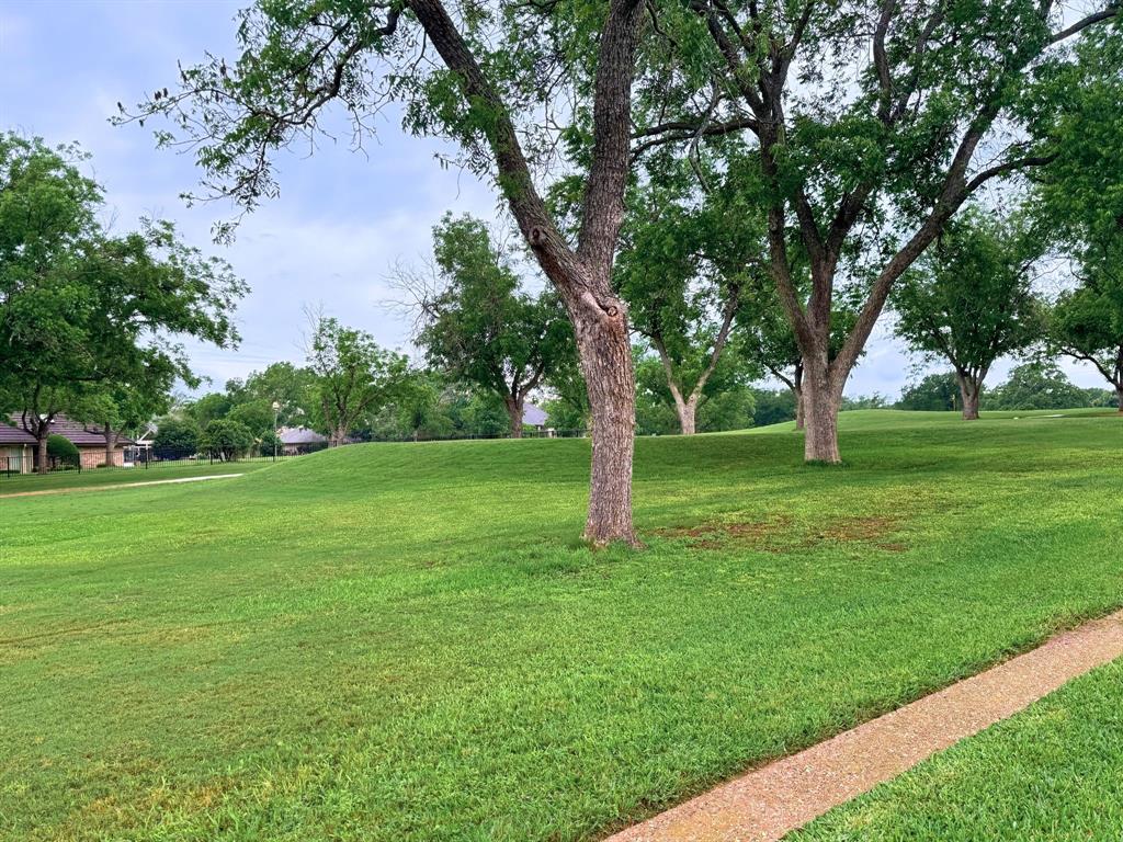 5131 Wedgefield Road Granbury, TX 76049 - Photo 6 of 33 5131 Wedgefield Road nestled on the lush greenery of Pecan Plantation's Golf Course
