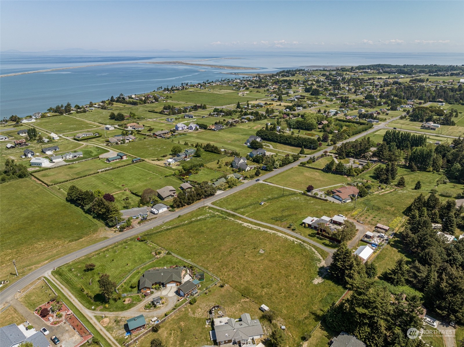 999 West Nelson Road, Unit B Sequim, WA 98382 - Photo 11 of 18 an aerial view of a residential houses with outdoor space