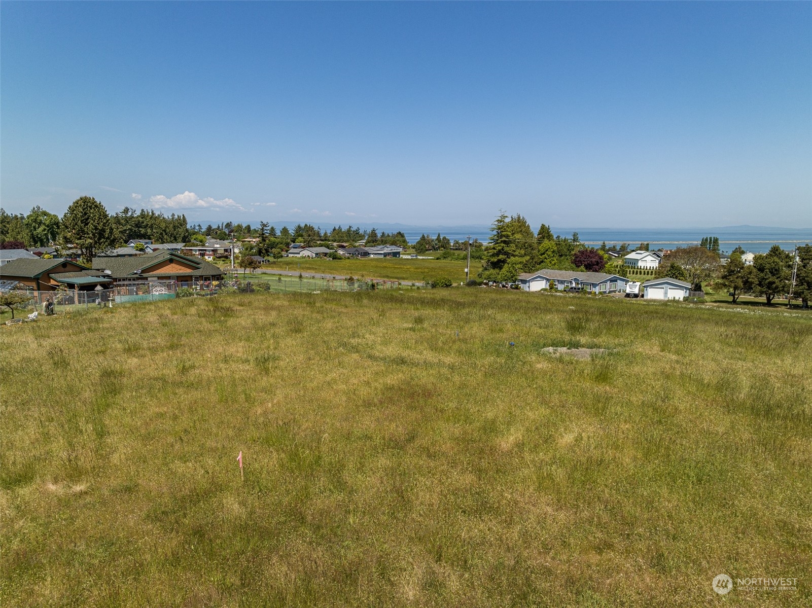 999 West Nelson Road, Unit B Sequim, WA 98382 - Photo 13 of 18 a view of an ocean with beach
