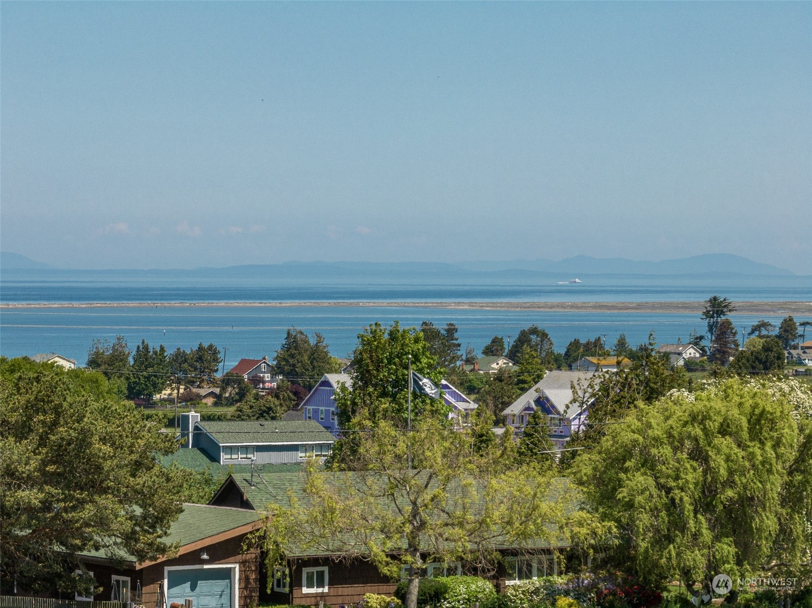 999 West Nelson Road, Unit B Sequim, WA 98382 - Photo 6 of 18 a view of a lake with a big yard