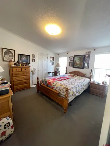 a view of a backyard with a garden