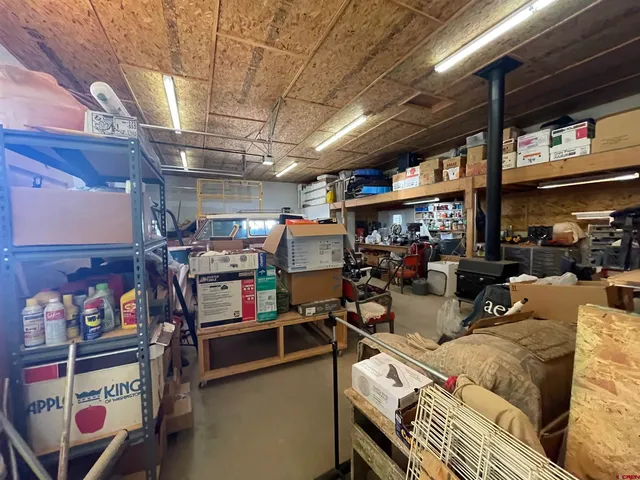 a view of a chairs and table in the patio