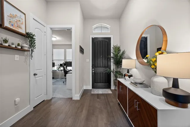 a kitchen with sink a refrigerator and a stove