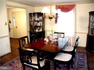 552 Bartram Road Moorestown, NJ 08057 - Photo 3 of 6 a view of a dining room with furniture and wooden floor
