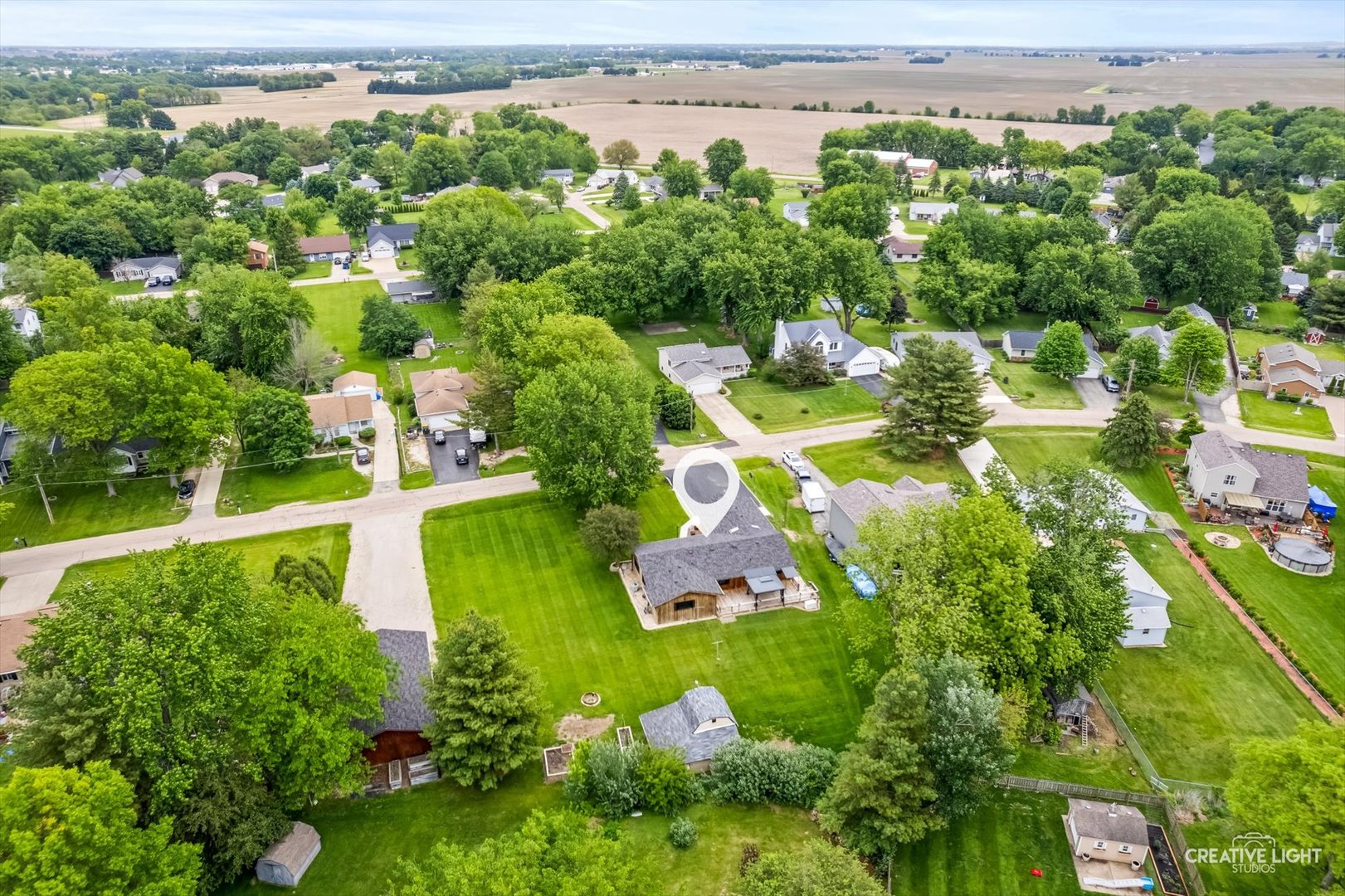 1483 Nova Road Sandwich, IL 60548 - Photo 26 of 29 an aerial view of a house with a yard and lake view