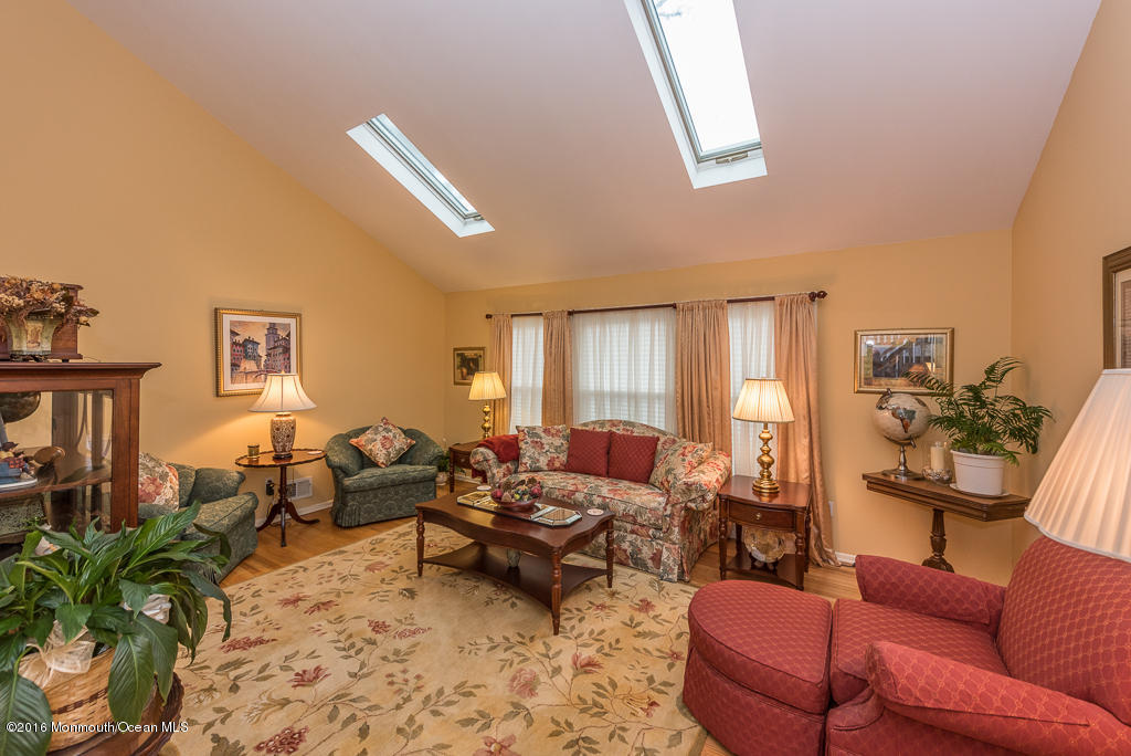 25 North Westfield Road Howell, NJ 07731 - Photo 11 of 25 a living room with furniture and a flat screen tv