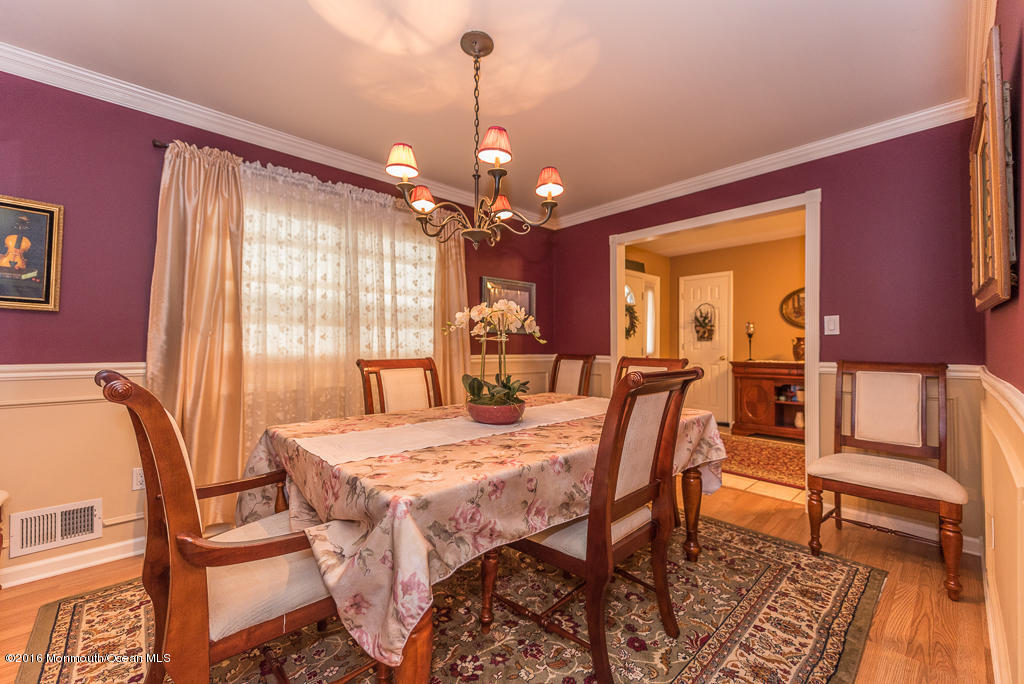 25 North Westfield Road Howell, NJ 07731 - Photo 4 of 25 a view of a dining room with furniture and a chandelier