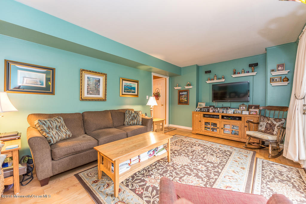 25 North Westfield Road Howell, NJ 07731 - Photo 10 of 25 a living room with furniture and a flat screen tv