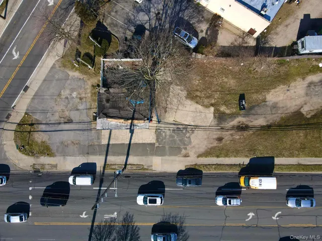an aerial view of houses with outdoor space