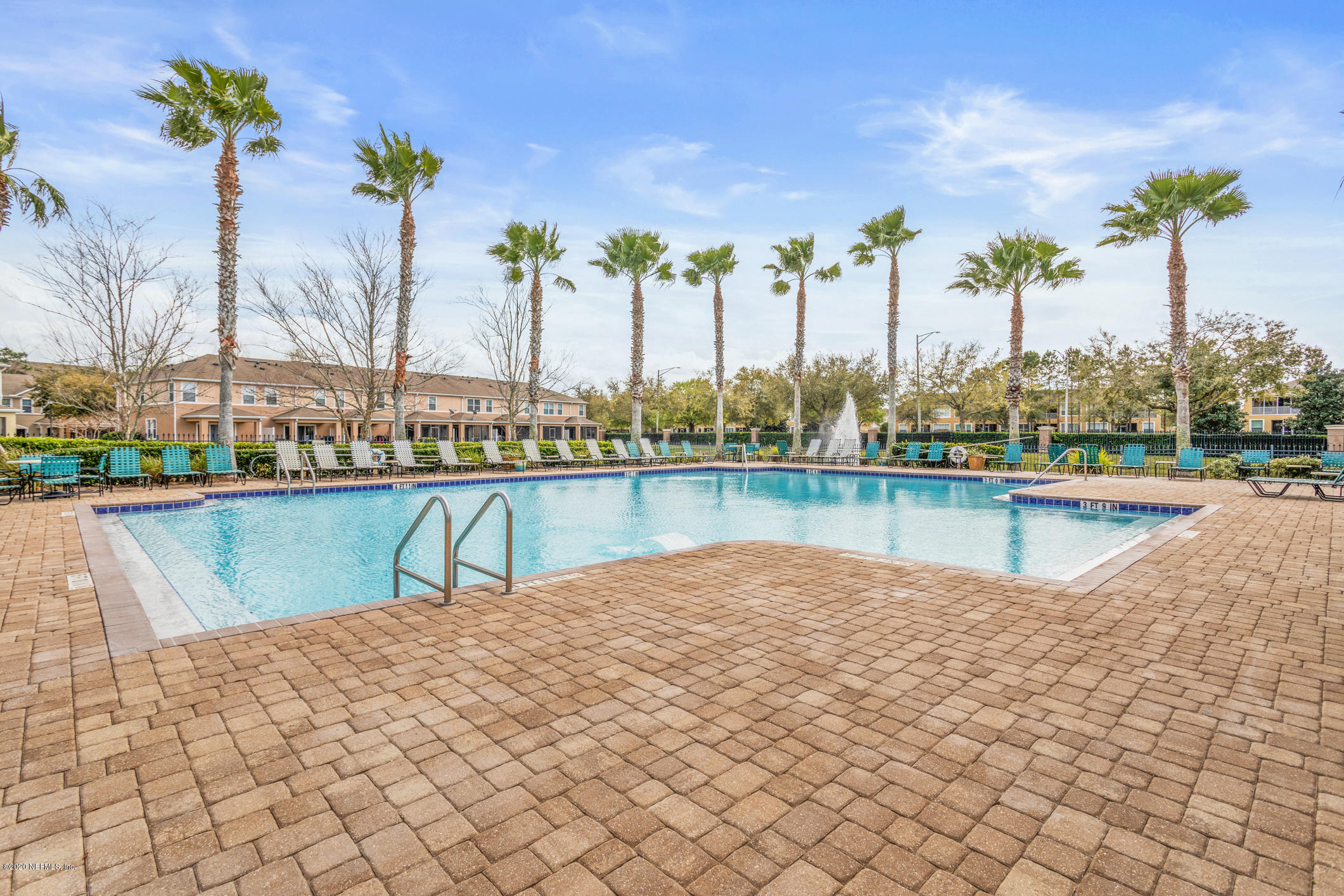 12940 Spring Rain Road Jacksonville, FL 32258 - Photo 15 of 20 a view of a lake with a palm and trees